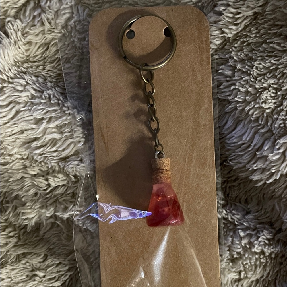 Red Bottle Keychain Accessory